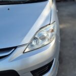 MAZDA PREMACY Left Front Head Light CR NON HID ELECTRIC ADJ 2005-2010