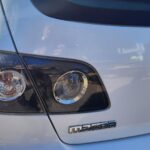 MAZDA AXELA / MAZDA 3 Rear Garnish / Moulding TAILGATE LAMP LH SIDE BK 2006-2009